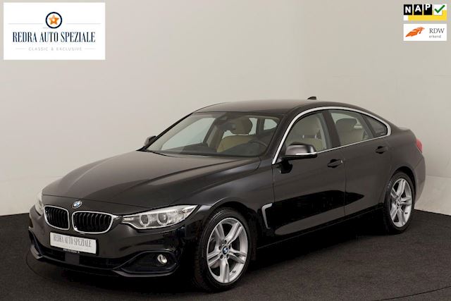 BMW 4-serie Gran Coupé 420i Centennial High Executive / Head-up / Harman-Kardon / Surround-camerasysteem / Sportstoelen