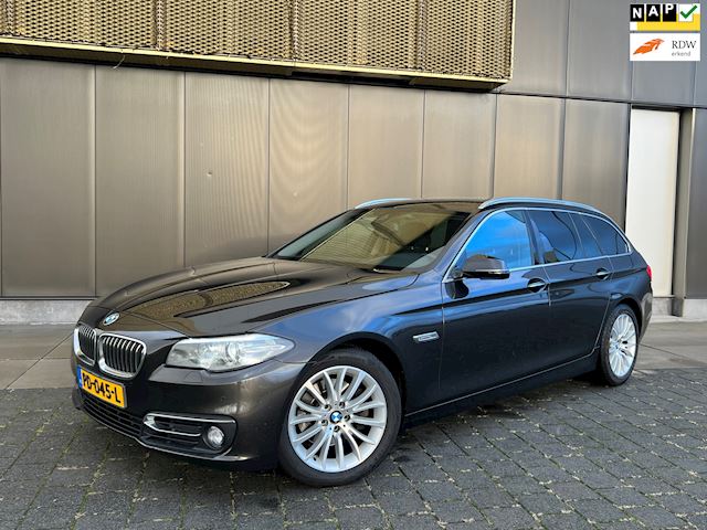 BMW 5-serie Touring 520d High Luxury Autom. /Navi/Stoelv./Parkeersens.