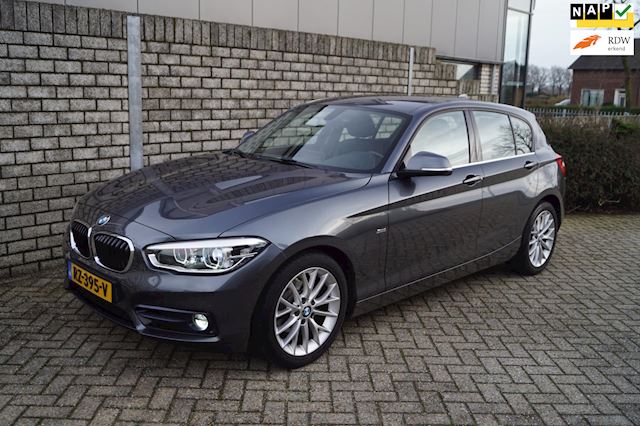 BMW 1-serie 118i High Executive Sport Line Autom Leder Sportst Stoelverw Navi Camera Clima LED Kopl Cruise 2x PDC LMV ENZ NL Auto.